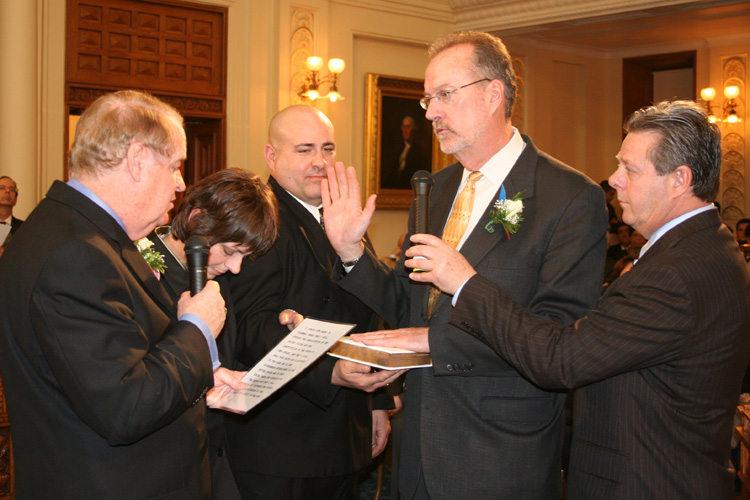 Senator Jim Whelan is sworn into the Senate by Senate President Richard J. Codey