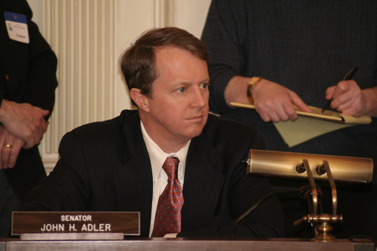 Senator John Adler (D-Cherry Hill) listens to testimony during the Senate Environment Community