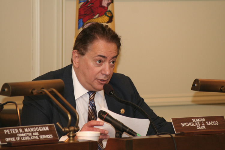 Senator Nicholas Sacco listens to testimony during the Senate Transportation Committee hearing.