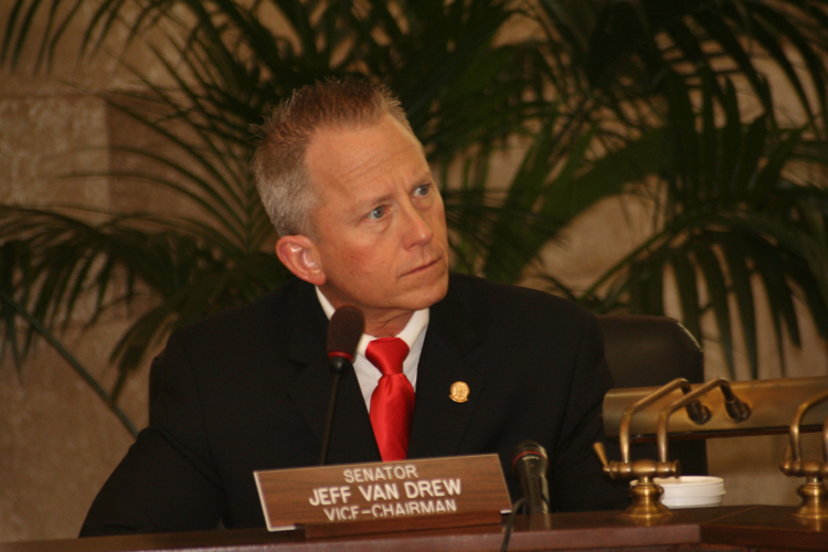 Senator Jeff Van Drew listens to testimony during the Senate Environment Committee.