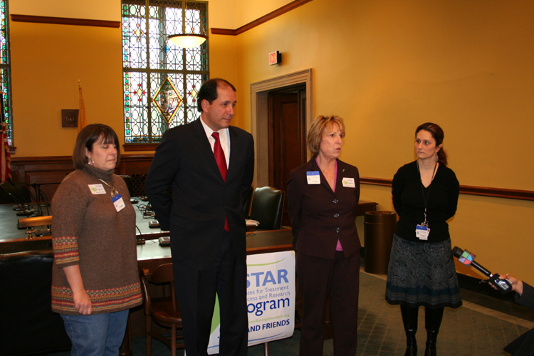 Senator Vitale and eating disorder advocates talk to reporters at a press conference