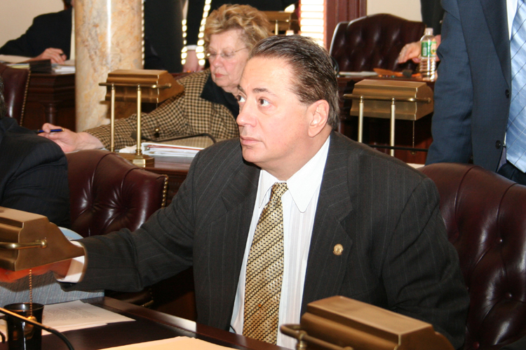 Senator Nicholas J. Sacco, D-Hudson and Bergen, votes in the Senate Chambers.