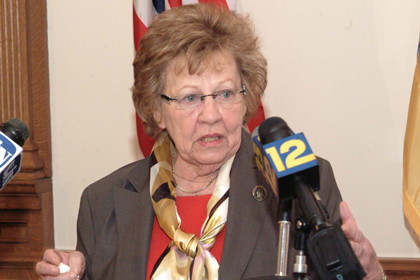 State Senator Loretta Weinberg, D-Bergen, the Chairwoman of the Senate Health, Human Services and Senior Citizens Committee, explains during a Statehouse news conference how cuts in charity care will result in more pressure on New Jersey hospitals, less services, more hospital closures, and higher premiums on people who have health insurance and subsidize care for those who do not.