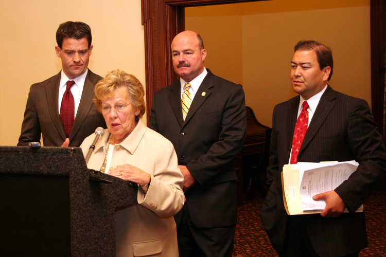 Senator Loretta Weinberg, D-Bergen, speaks at a news conference about the need for a bill to require legislators to disclose the source of any income, direct or indirect, derived from public sources, while Senators Fred Madden, D-Gloucester and Camden, Bill Baroni, R-Mercer and Middlesex, and Kevin O’Toole, R-Essex, Bergen and Passaic, look on.