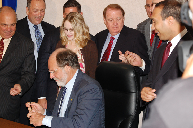 Governor Jon Corzine officially signs legislation sponsored by Senator Joseph F. Vitale, D-Middlesex, which would put New Jersey on the right track towards affordable health care for all State residents.