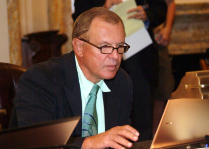 Senator Raymond J. Lesniak, D-Union, reviews bill information on the floor of the New Jersey State Senate during a voting session.