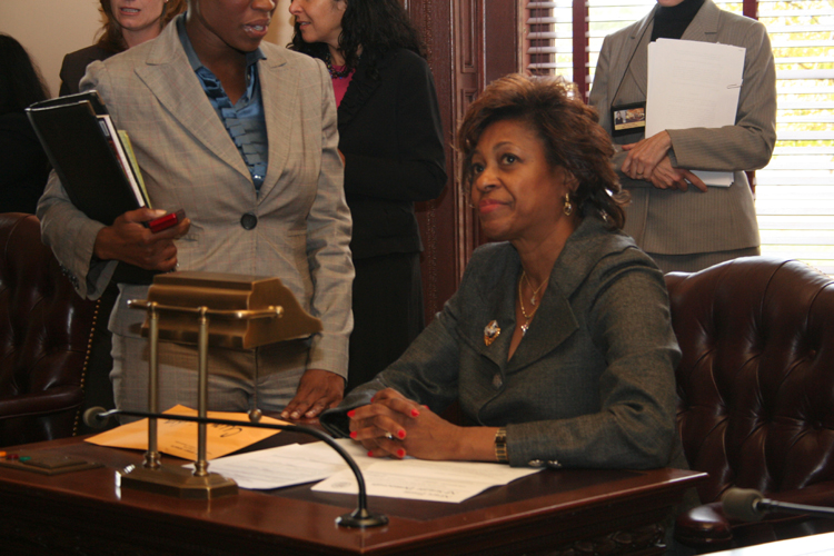 Senator Cunningham sits at her desk in the Senate Chambers