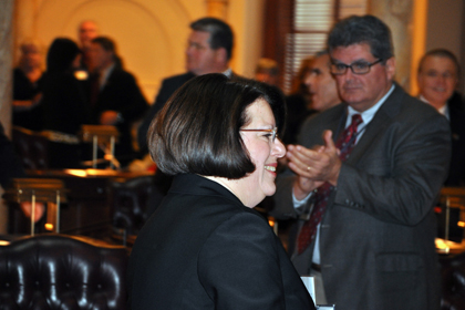 State Senator Linda Greenstein makes her way to the podium to be sworn in as the new senator from the 14th Legislative District.