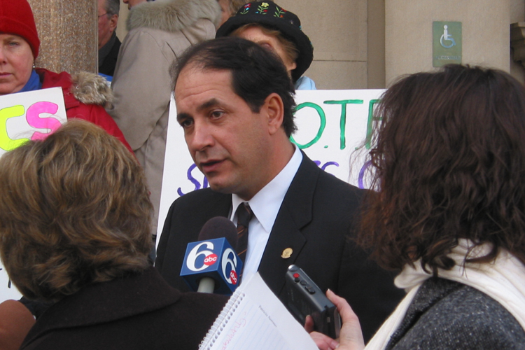 Senator Joseph F. Vitale, D-Middlesex, speaks to reporters after a news conference on the Statehouse steps on his efforts to limit charitable immunity in cases when the charity acts negligently in protecting children from sexual abuse.